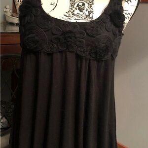 Urban Behavior Black Stretch Sleeveless Top Size XS w/floral rosette appliqué